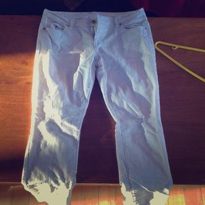 Lightly used distressed white jeans